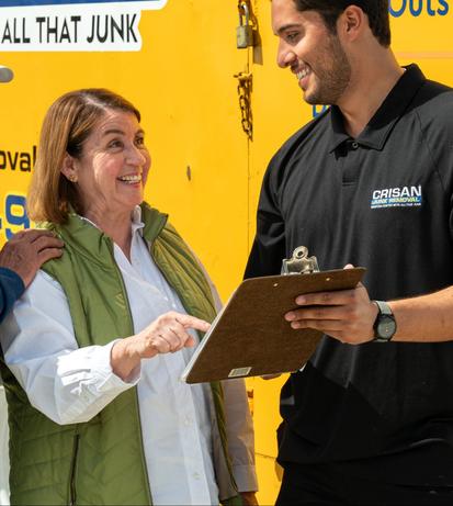 Crisan team lead reviewing a free quote with a happy client